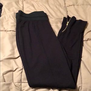 Legging with zipper detail at ankle. Never worn.